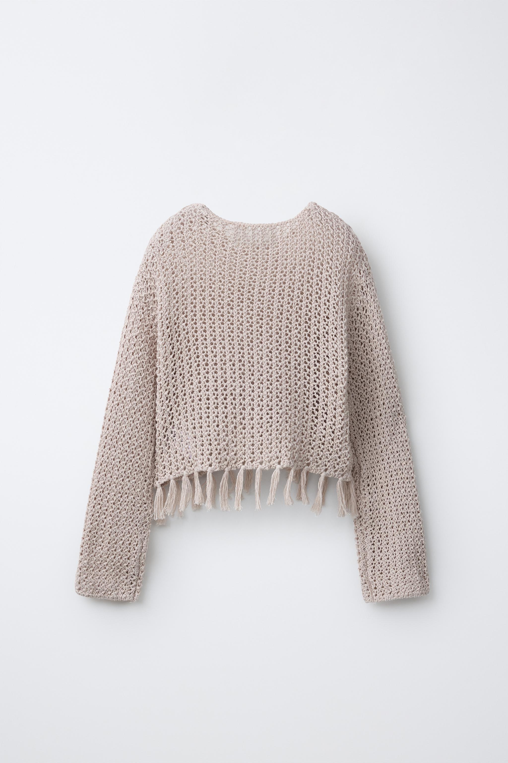 PULL EN MAILLE À FRANGES